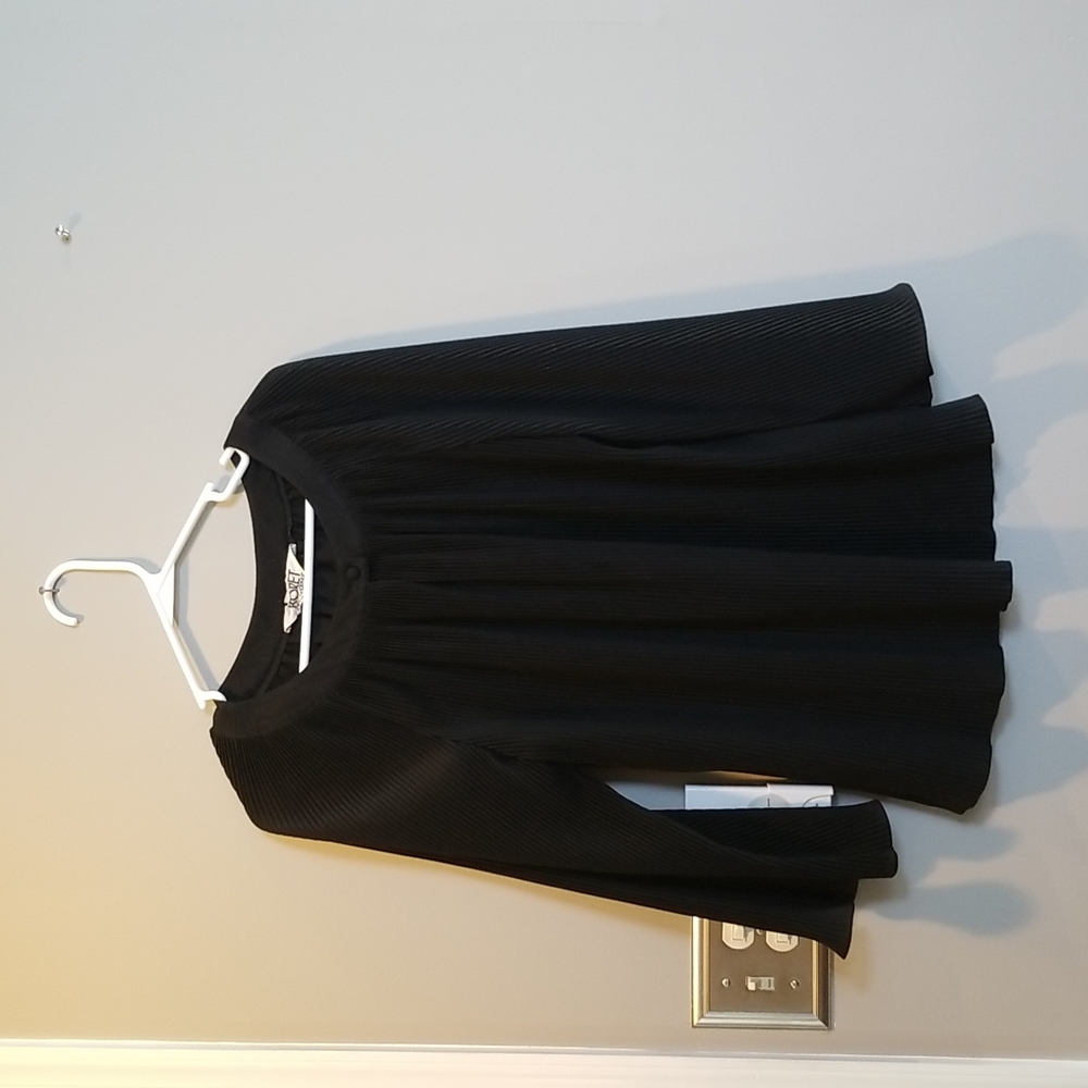 Black flared blouse.